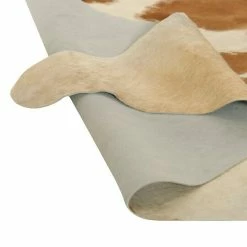 BAUHAUS Esbeco Deko-Kuhfell Braun/Weiß, 100 % Echtfell, Fläche Ca.: 3 M² - 4 M² -Bodenfliesen Verkäufe 12 2484