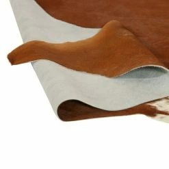 BAUHAUS Esbeco Deko-Kuhfell Braun/Weiß, 100 % Echtfell, Fläche Ca.: 3 M² - 4 M² -Bodenfliesen Verkäufe 12 2485